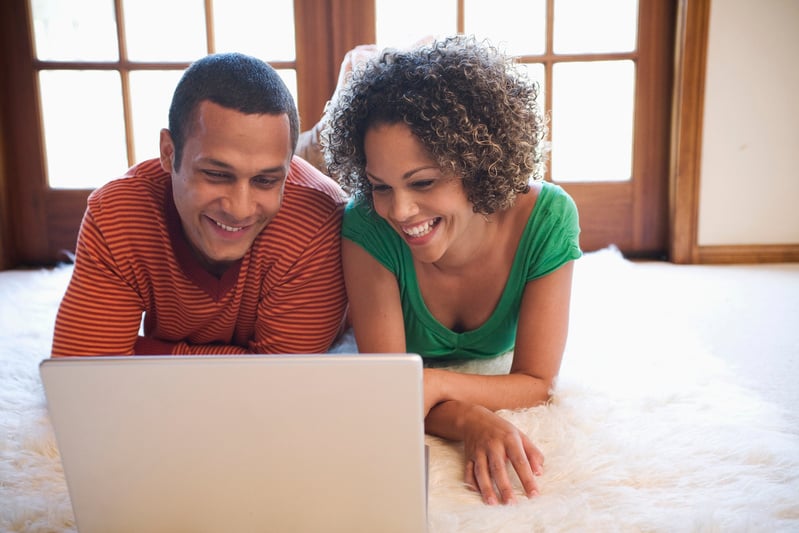 Couple looking at laptop computer